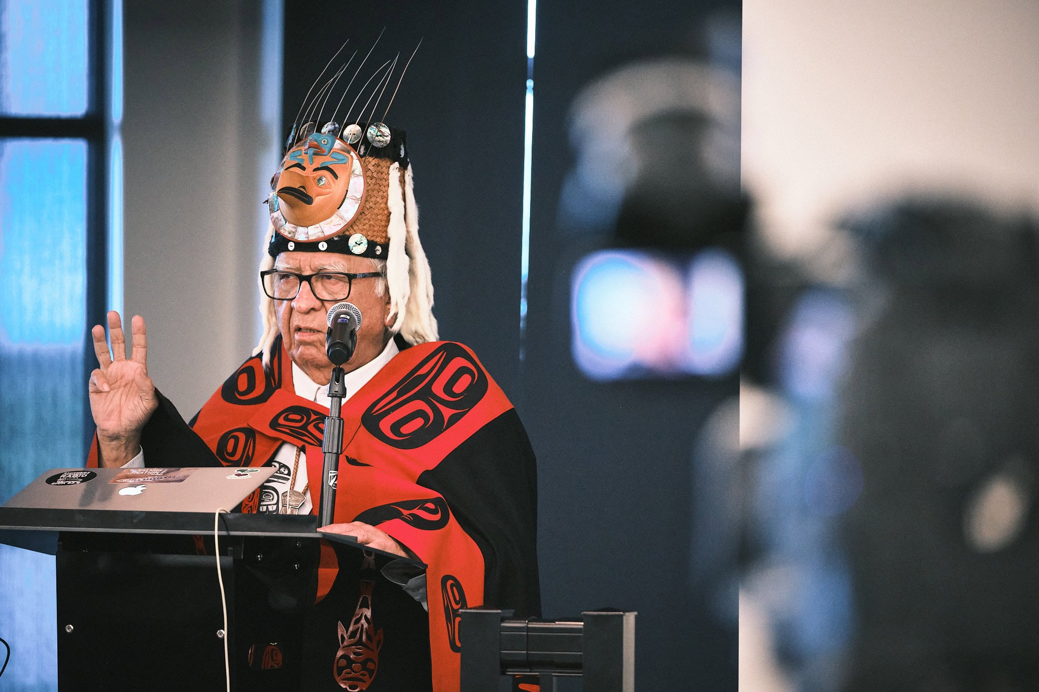 Algax’m Hax, Murray Smith, in regalia, speaking at a salmon summit in Prince Rupert, B.C.