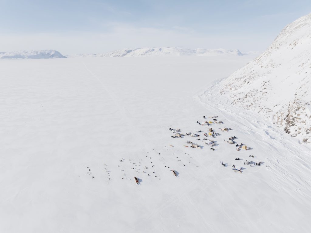 An aerial view of a camp on the sea ice in the Arctic.