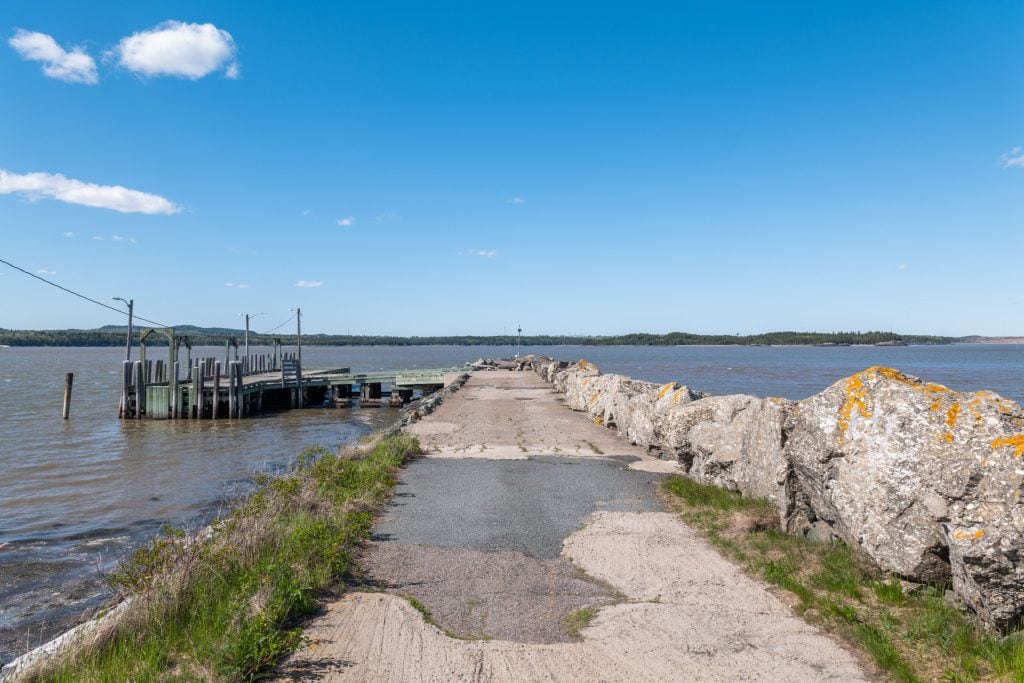 A wharf extends into the Bay of Fundy in the Lorneville neighbourhood of Saint John, N.B.