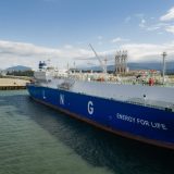 A blue tanker with the words LNG energy for life sits at a dock in Kitimat.