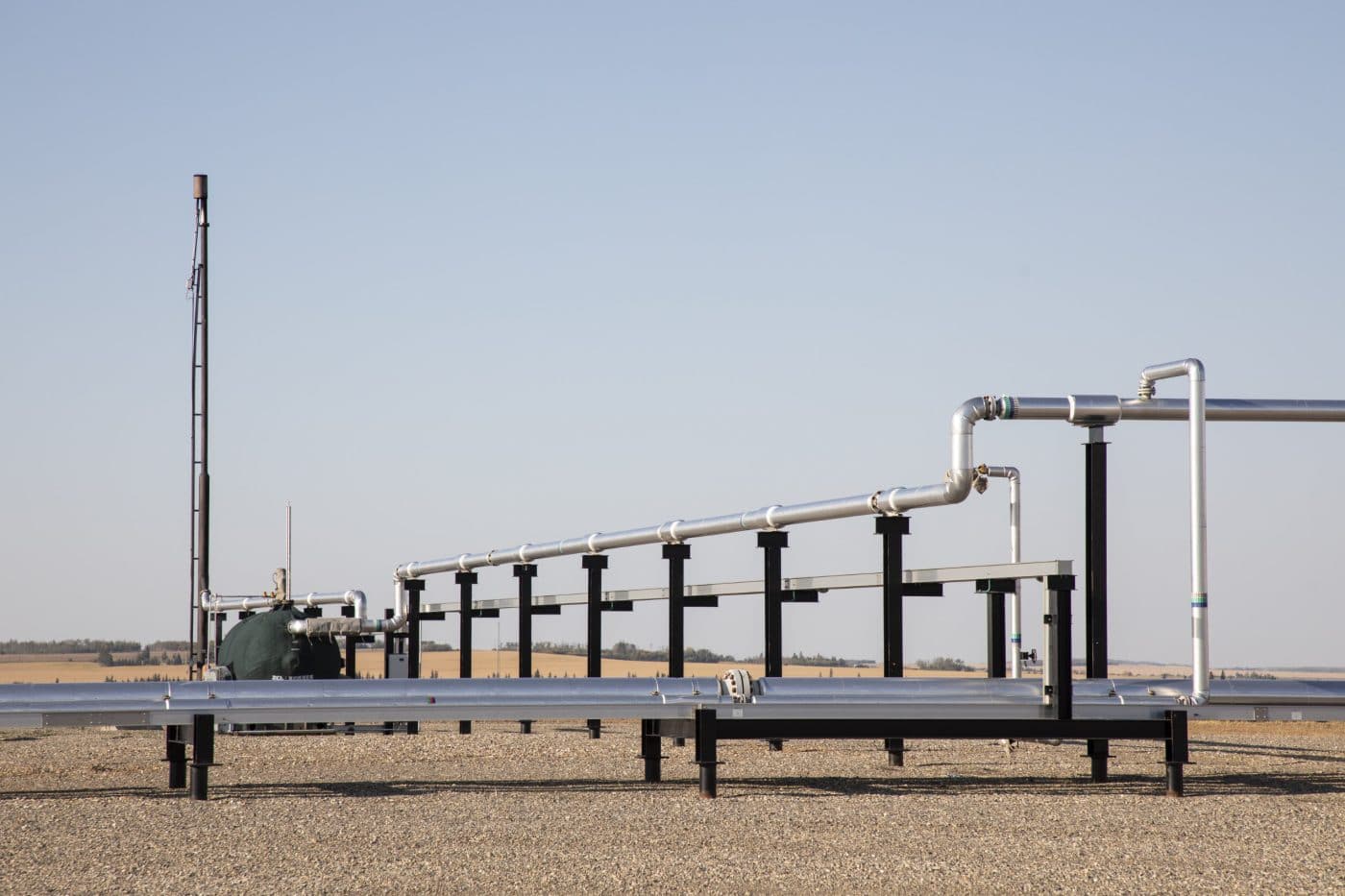 Oil and gas infrastructure in a farmers field.