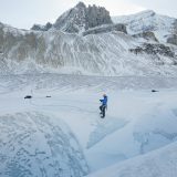 A mountain guide charts a path down the Athabasca Glacier in Jasper National Park.