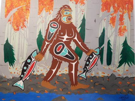 An illustration of D’sonoqua, Sasquatch’s female companion in Kwakwaka'wakw tradition, carrying two fish.