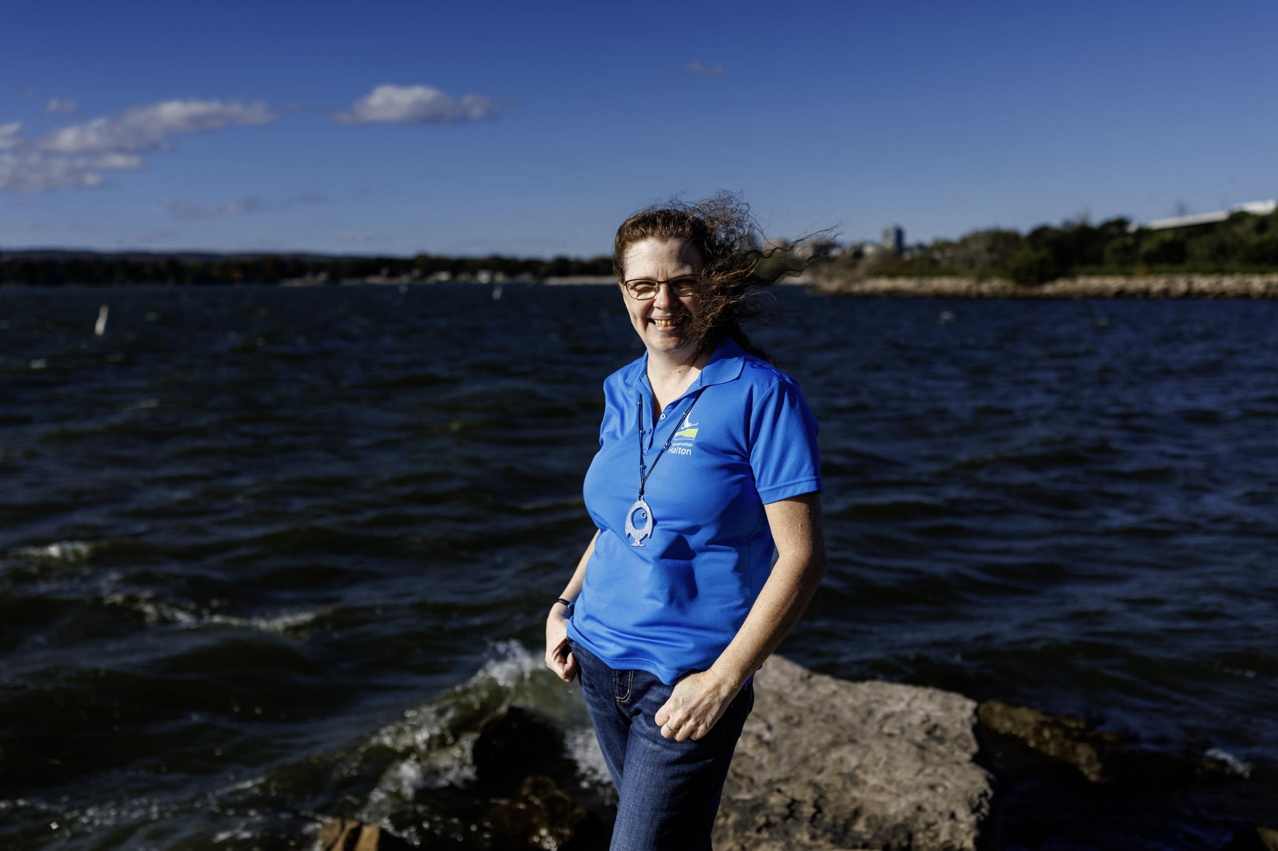 Kristin O'Connor poses for a photo on the shore of the Hamilton Harbour in Burlington, Ontario.
