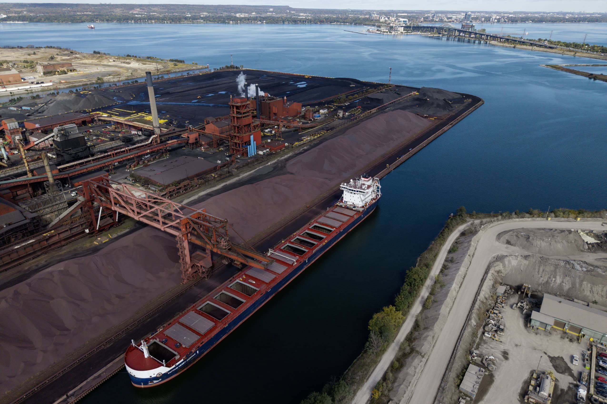 An aerial view of a ship docked in ArcelorMittal Dofasco's boat slip on the Hamilton Harbour.