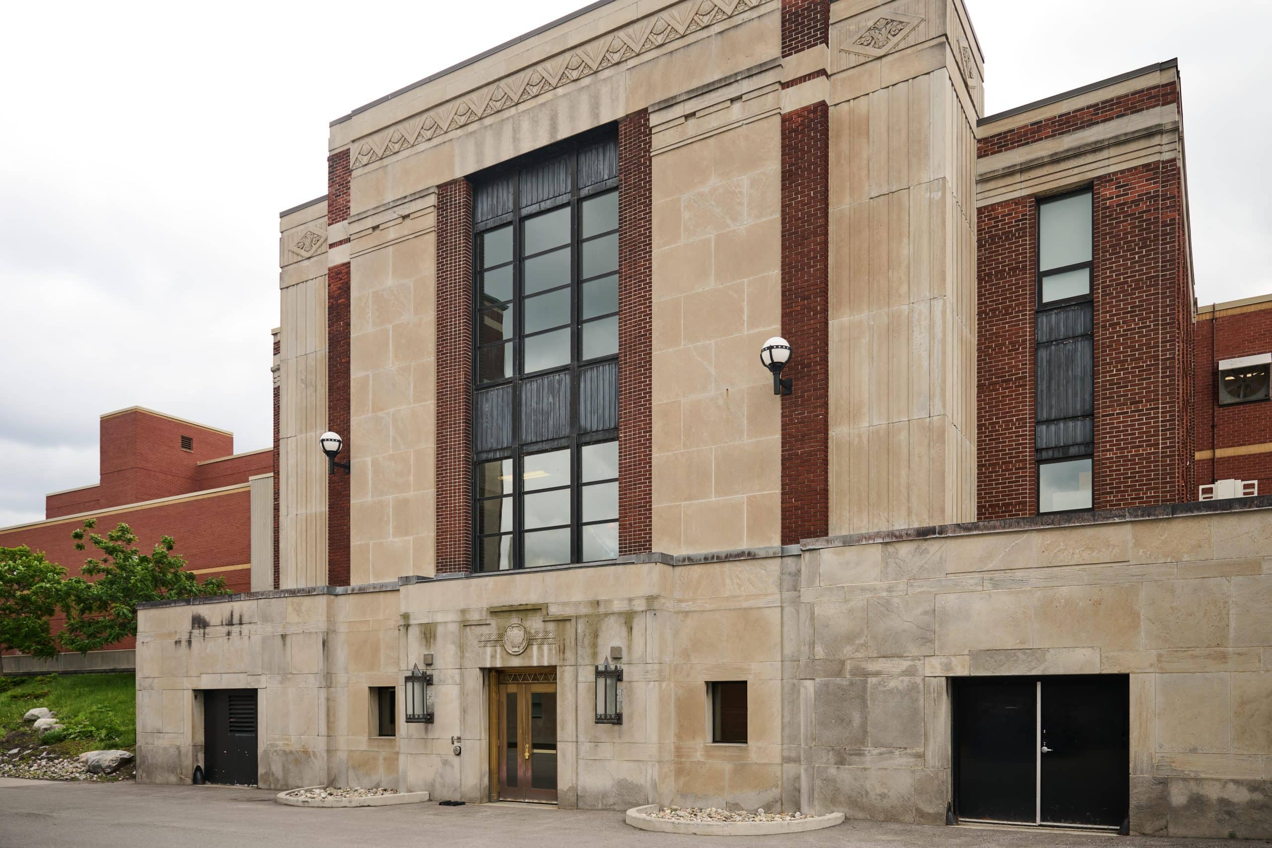 Yellow and red brick building in an Art Deco style.