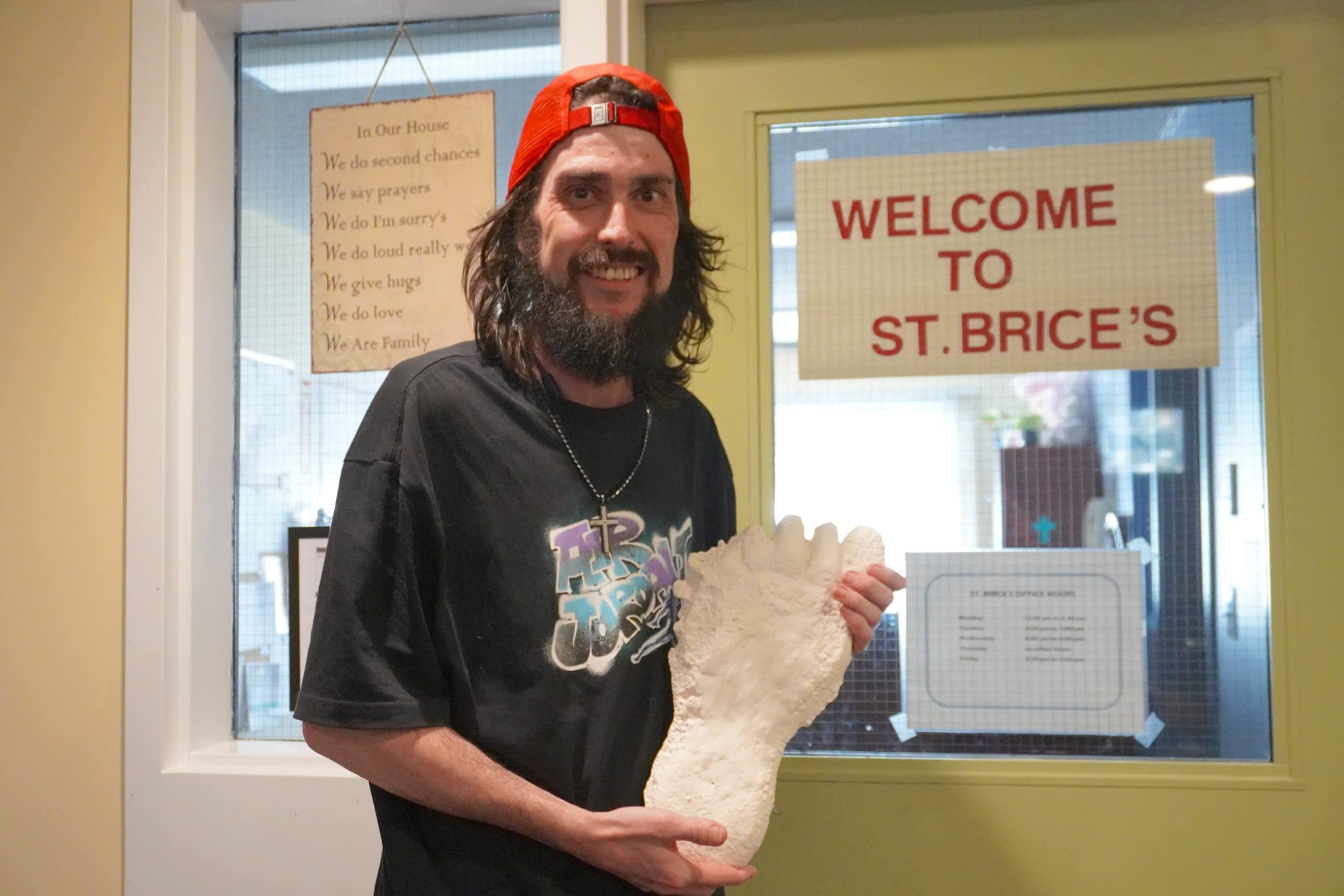 Andrew MacKellar, an avid ’squatcher and organizer of North Bay's first Sasquatch conference, holds a plaster cast of a footprint believed to be that of Bigfoot at St. Brice's church.